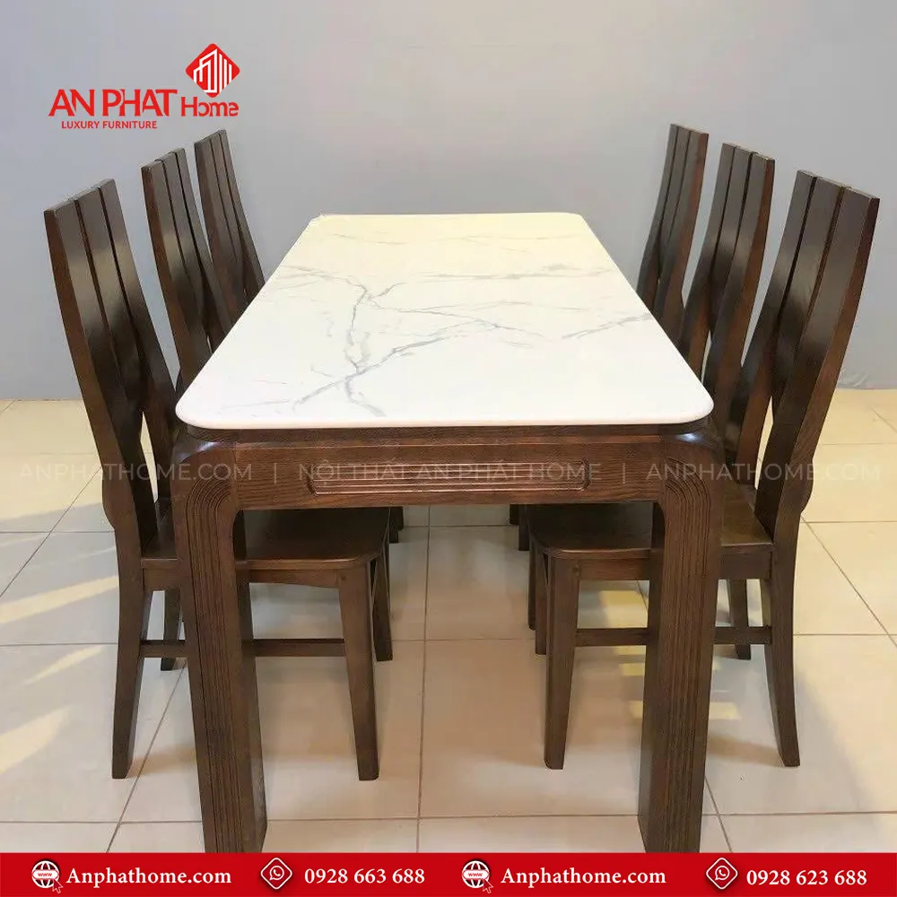 Bàn ăn gỗ mặt đá ceramic 6 ghế BA-2063 3 Bàn ăn gỗ mặt đá ceramic 6 ghế BA-2063, quý khách có thể lựa chọn kích thước bàn từ dài 1m20 – 1m80 hoặc lớn hơn, để phù hợp với nhu cầu sử dụng, Bộ bàn 1m20 sẽ đi kèm 4 ghế, bàn 1m40 – 1m60 – 1m80 đi kèm 6 ghế theo bộ, Ngoài da có thể đặt mua thêm số lượng ghế ngồi để phù hợp với nhu cầu sử dụng.