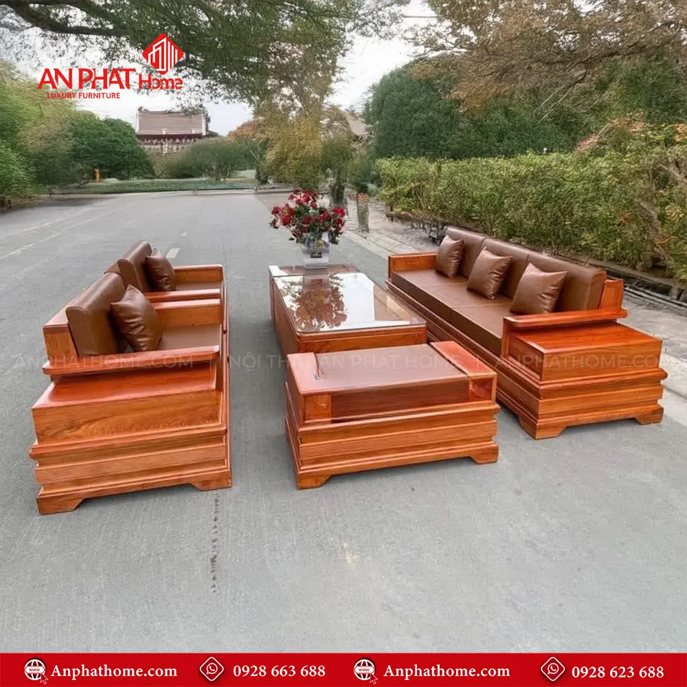 Bộ Bàn Ghế Sofa Pháo Đối Gỗ Hương Đá F-1304 3 Bộ Bàn Ghế Sofa Pháo Đối Gỗ Hương Đá F-1304, Được thiết kế sang trọng, Là sự kết hợp hài hòa từ gỗ Hương đá, và nét hiện đại từ chất liệu da nhập khẩu Hàn Quốc, Chi tiết đục của nghệ nhân, tác phẩm sofa gỗ được những nghệ nhân AN PHÁT HOME trạm khắc tỉ mỉ từng đường nét chi tiết hoa văn, mang lại nét đẹp hài hòa cho bộ bàn ghế sofa F-1304